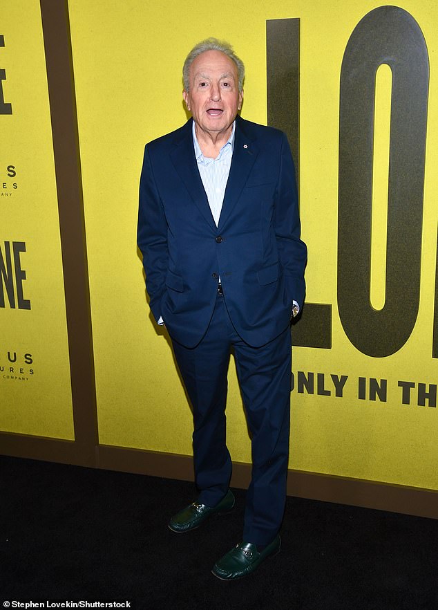 Lorne Michaels suited up for the occasion in a navy blue blazer, slacks and a pale blue button-up shirt