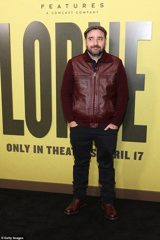 Numb3rs alum David Krumholtz strolled the event's step-and-repeat photo op in a red leather jacket and a brown plaid newsboy cap
