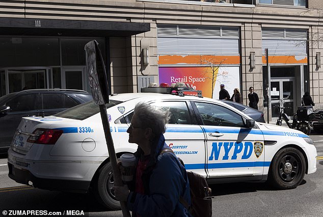 Police responded within one minute to reports of drag racing and quickly dispersed the gathering, but three people jumped on a patrol car and cracked its windshield before fleeing