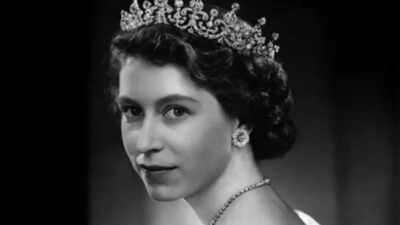 Transparent raincoat to coronation dress: Queen Elizabeth II's five iconic outfits from her royal exhibition