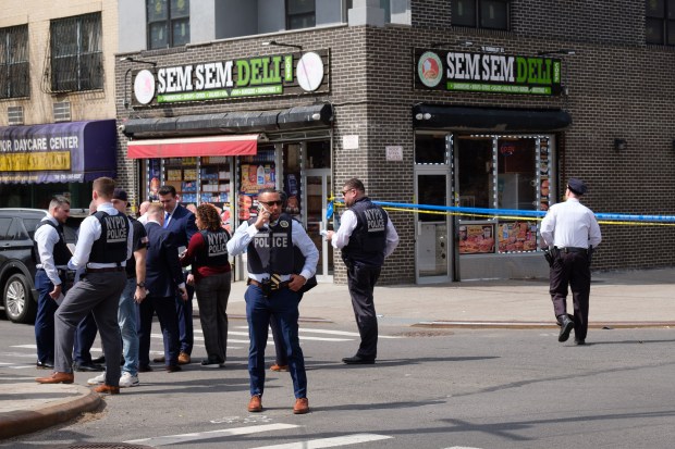 Police investigate after a 7-month-old baby girl in a stroller was fatally shot near Humboldt and Moore Sts. in East Williamsburg, Brooklyn, on Wednesday, April 1, 2026. (Gardiner Anderson / New York Daily News)