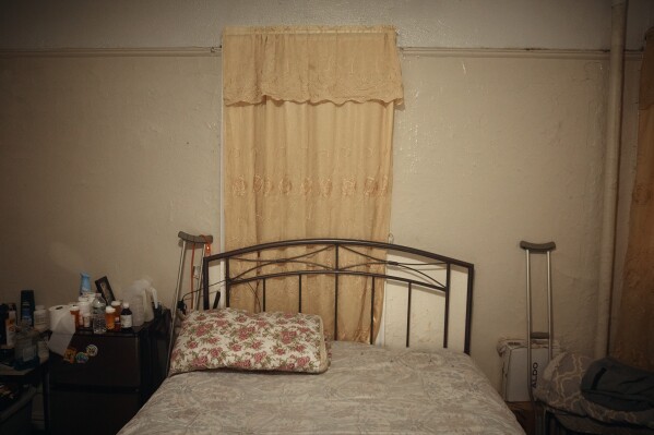 Tommy Rodriguez's room, 45, in an apartment building where tenants report maintenance issues and pest infestations, in the Bronx borough of New York, on Tuesday, March 17, 2026. (AP Photo/Andres Kudacki)
