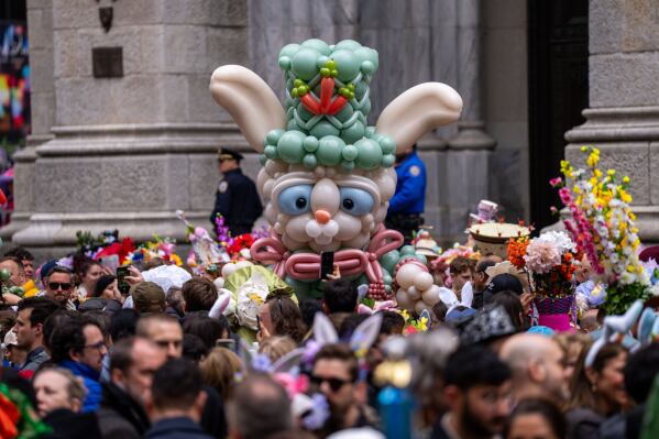 People participate in the Easter Bonnet Parade on Fifth Avenue, Sunday, April 5, 2026, in New York. (AP Photo/Adam Gray)