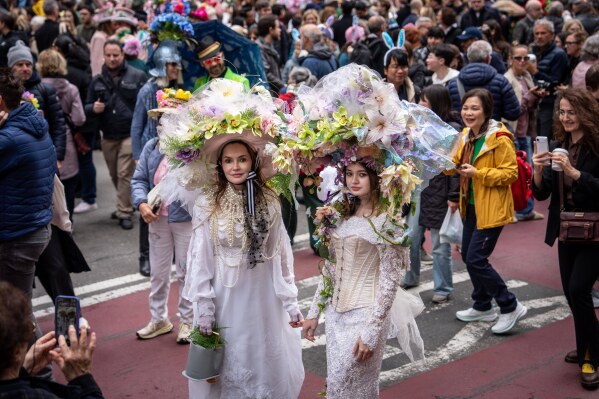 People participate in the Easter Bonnet Parade on Fifth Avenue, Sunday, April 5, 2026, in New York. (AP Photo/Adam Gray)