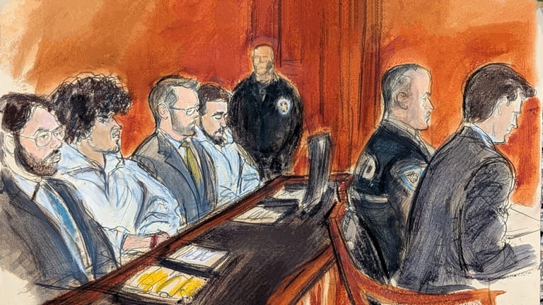 From left, defense attorney Mehdi Essmidi, defendant Emir Balat, defense...