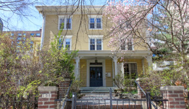 fort greene - a yellow wood frame house