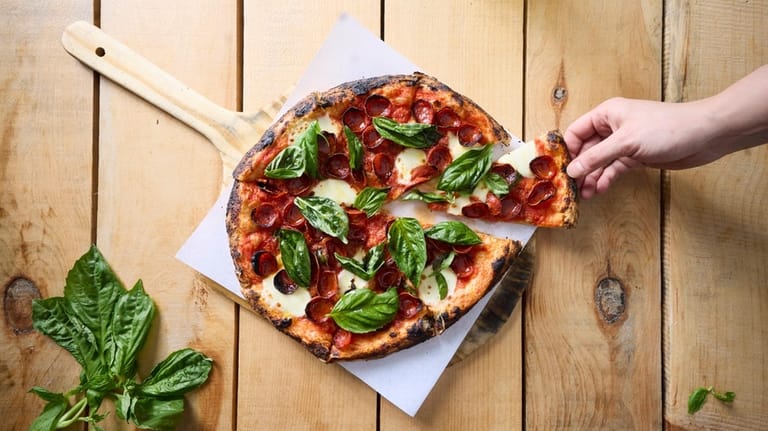 The Little Piggy pie is topped with tiny Battistoni "cup...