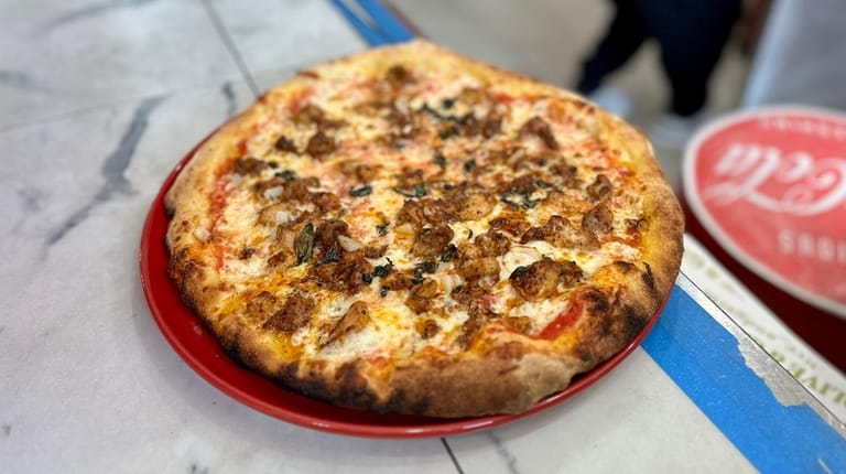 The chicken tikka masala pizza at Olive & Garlic.