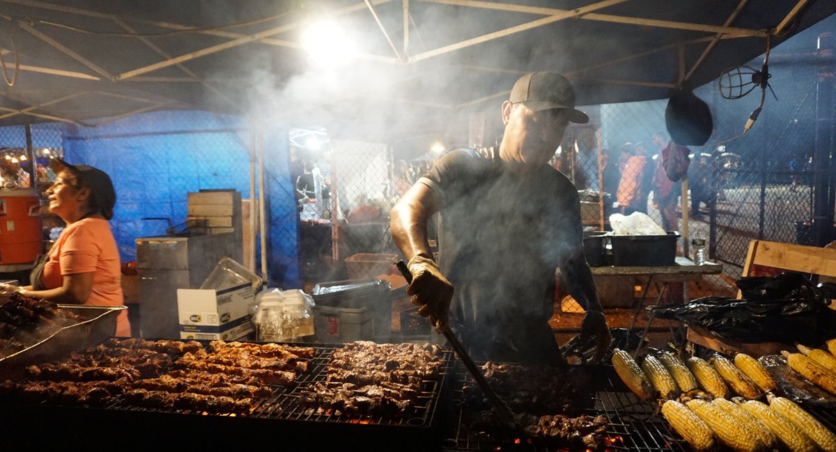 Head to the Queens Night Market for a smorgasbord of cheap street food