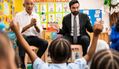 Former President Barack Obama and Mayor Zohran Mamdani sing "Wheels on the Bus" to children at Learning Through Play Pre-K in the Bronx in New York, Saturday, April 18, 2026. (AP Photo/Angelina Katsanis)