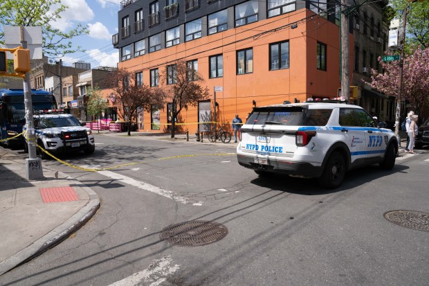 A 32-year-old woman was struck and killed by the driver of a box truck while in the crosswalk at Gates Ave. and St. Nicholas Ave. in Ridgewood, Queens, on Friday, April 17, 2026. (Theodore Parisienne / New York Daily News)