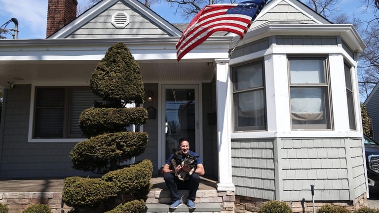 Ron Whelan, with his dogs Chloe and Chanel, bought this...