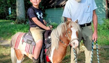 John Monahan, right, is suing Unbridled Sanctuary to get his miniature horse Teddy back after the equine was hit by a train.