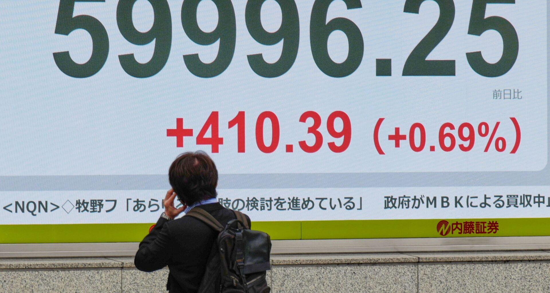 Asian stocks retreat and oil tops $100 despite fresh records on Wall St
