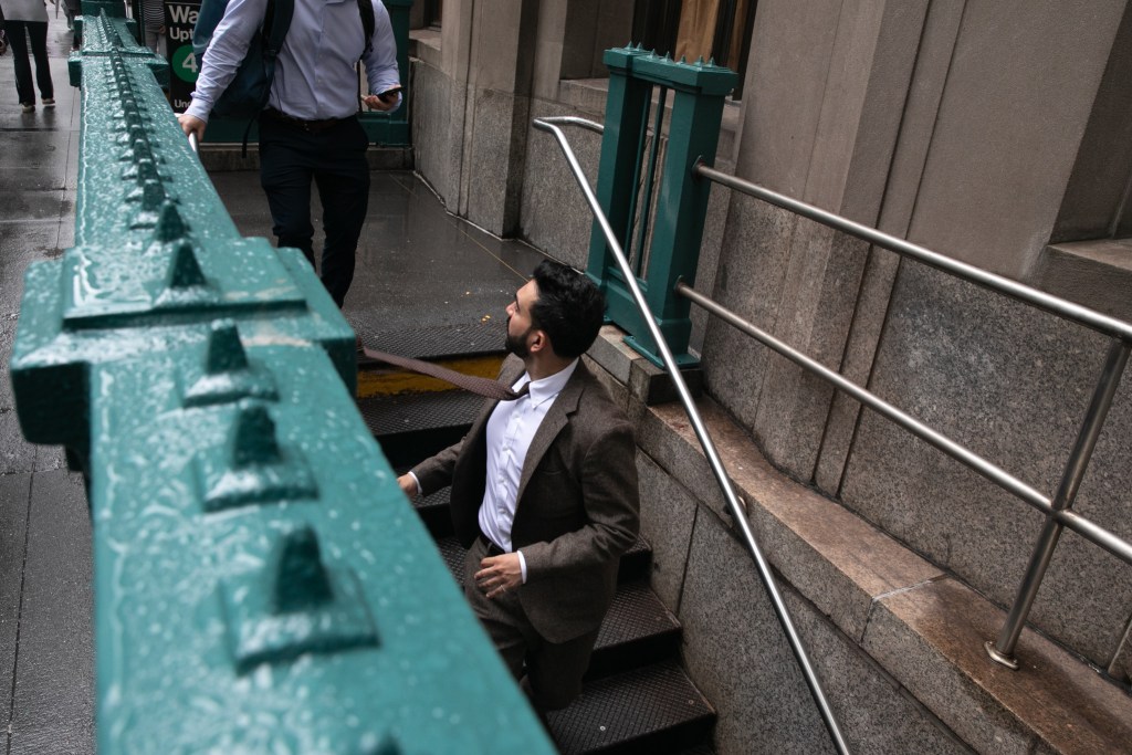 Mayoral candidate Zohran Mamdani heads into the 4-5 Wall Street station after a campaign event.