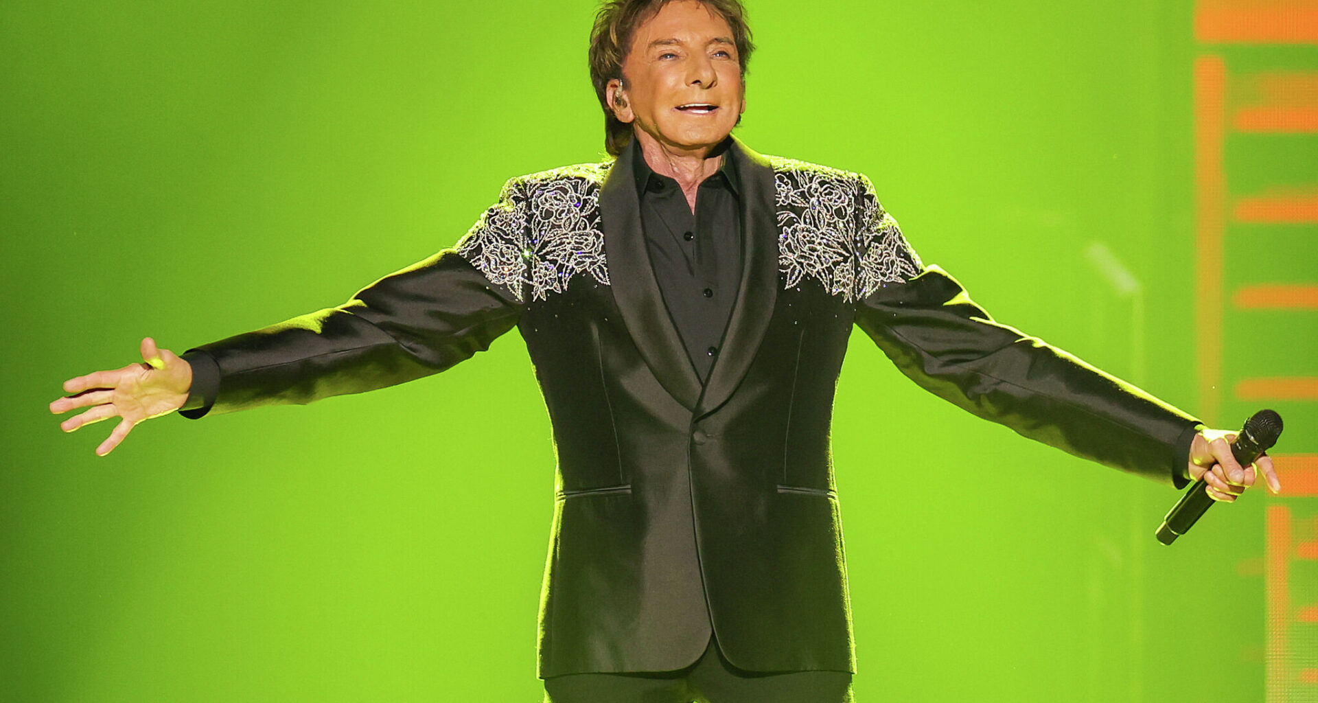 Singer Barry Manilow performs onstage during the “Manilow: The Last Seattle Concert” at Climate Pledge Arena on July 12, 2025, in Seattle, Wash. After postponing concerts due to lung cancer recovery, Manilow announced a new date for his Albany engagement. 