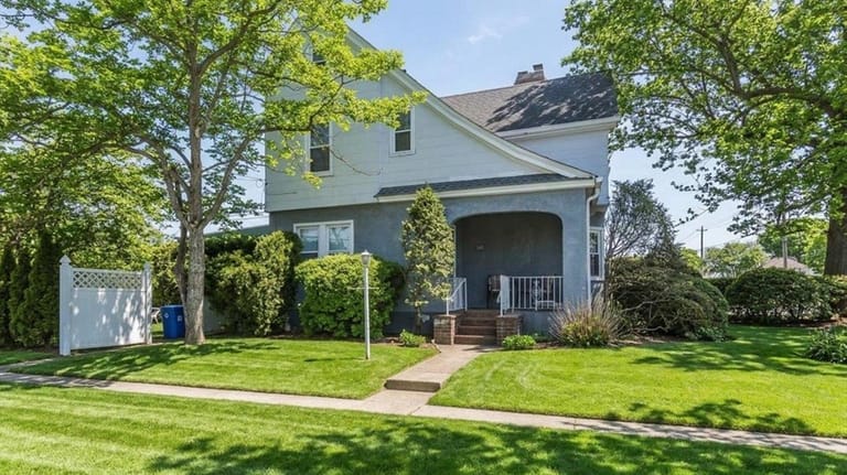 This $829,000 Garden City Park home is nearly 2,000 square...