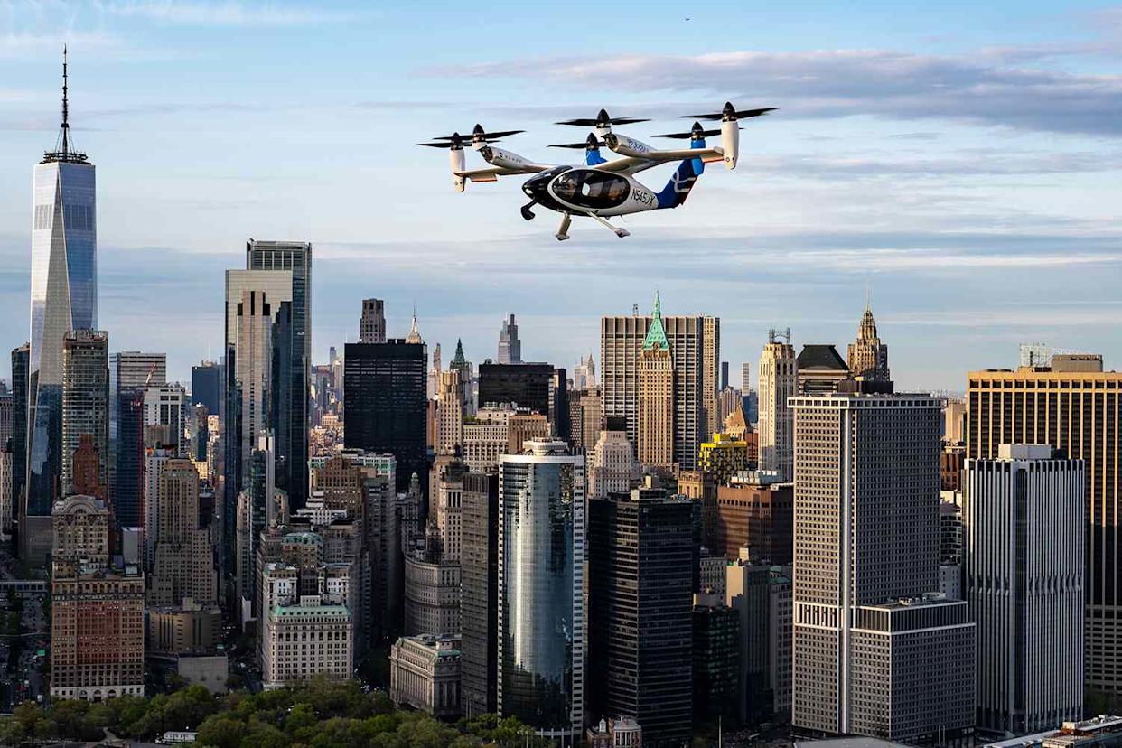 A Joby Aviation air taxi flying next to the Manhattan skyline.Credit: Joby Aviation