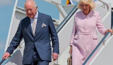King Charles III and Queen Camilla, who wears the Cartier Union Jack and Stars and Stripes Brooch, disembark their plane as they arrive on day one of their State Visit to the United States, on April 27, 2026 at Joint Base Andrews, Maryland.