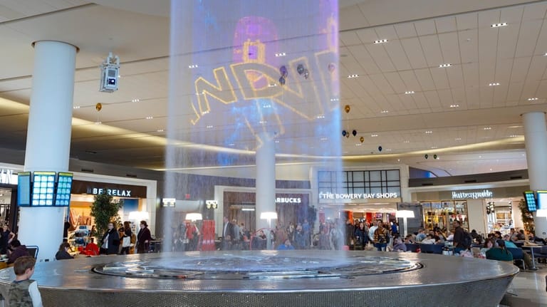 A water feature anchors the transformed Terminal B at LaGuardia...