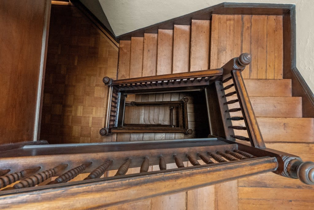 A handsome staircase connects the levels. Platinum Forbes Global Properties