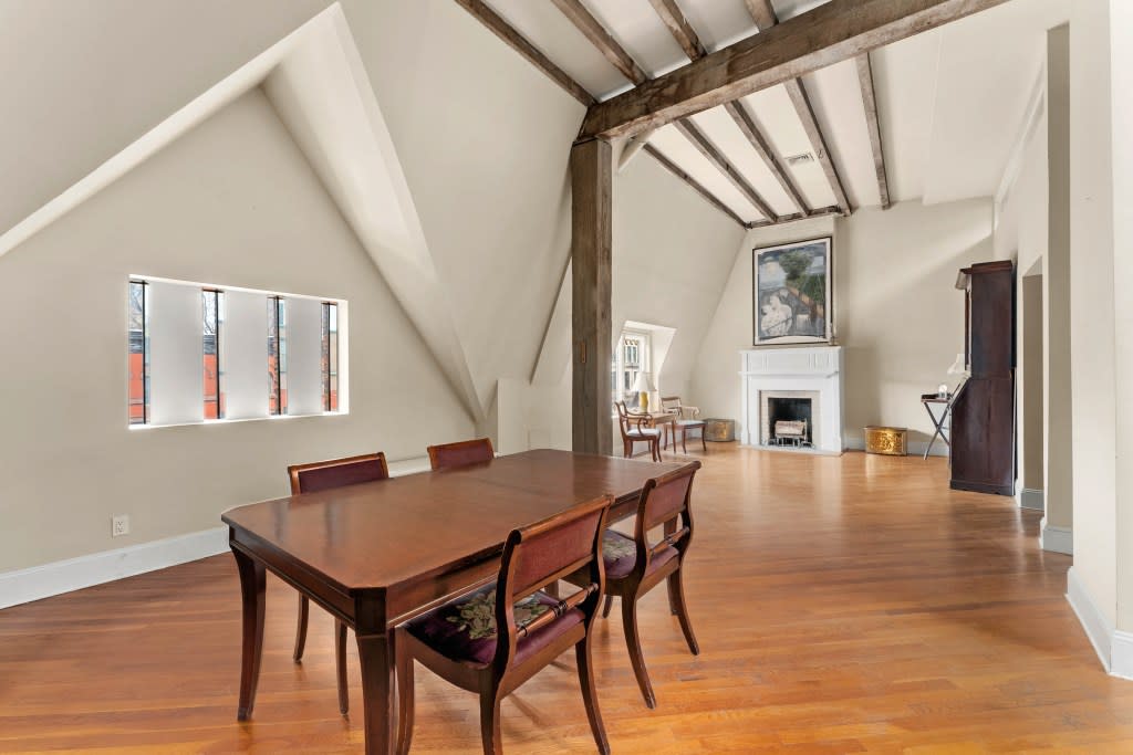 Beamed ceilings add charm to the top floor loft. Platinum Forbes Global Properties