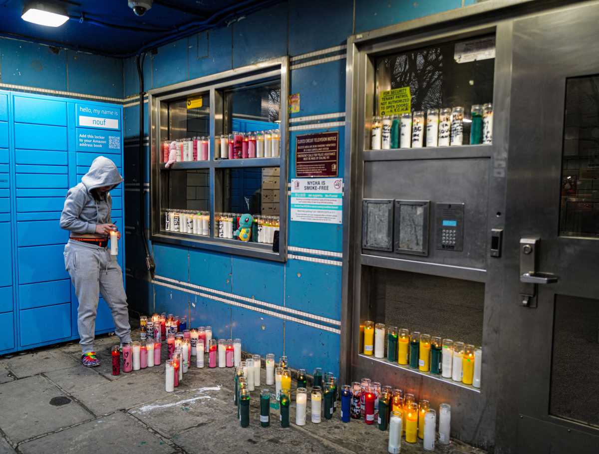 candles at vigil in Brooklyn for baby shot dead with stray bullet