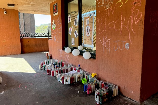 A memorial outside 30 Richman Plaza in the Bronx for victim Justin Chatfield, who was fatally shot inside the building on April 2, 2026.