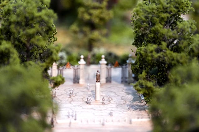 A statue of Queen Elizabeth II in a model of St James’s Park 