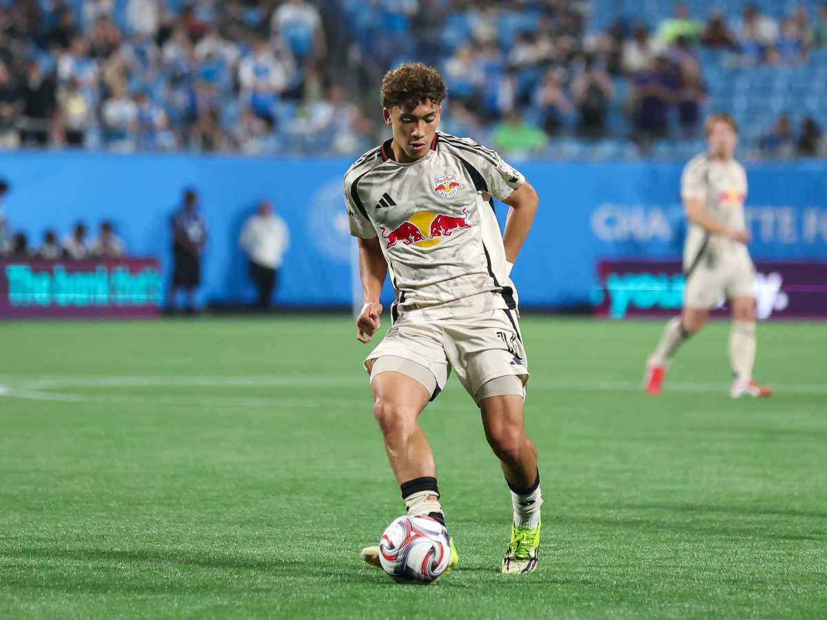 New York Red Bulls player Julian Hall kicking ball