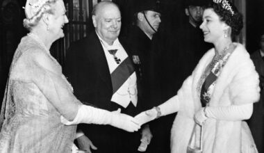 Queen Elizabeth II and the Duke of Edinburgh arrive for a dinner party given by Winston and Clementine Churchill at Downing Street in London on April 4, 1955 (PA Images/Alamy)
