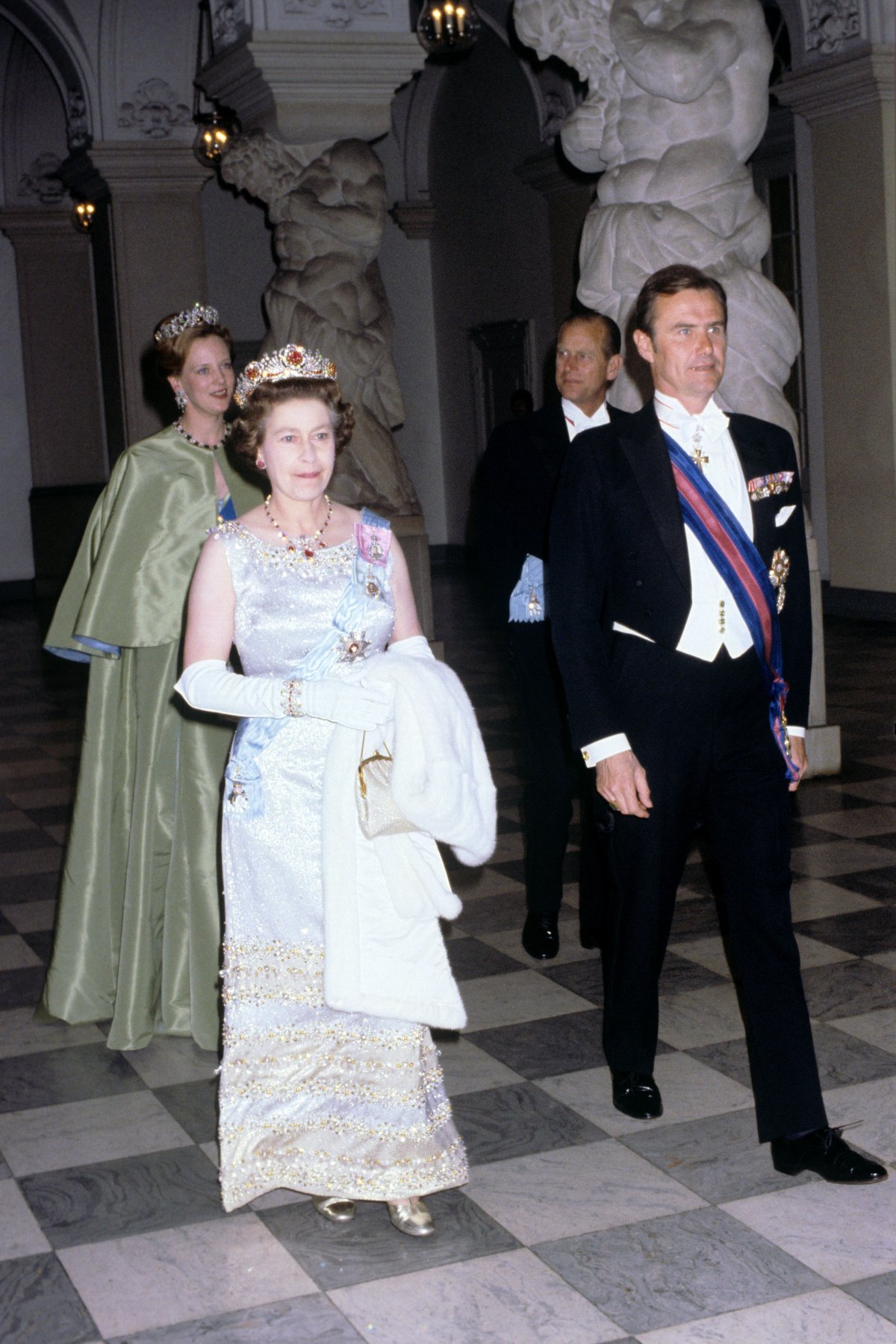 Queen Margrethe II and Prince Henrik of Denmark host a state banquet in honor of Queen Elizabeth II and Prince Philip of the United Kingdom at Christiansborg Palace in Copenhagen on May 16, 1979 (PA Images/Alamy)