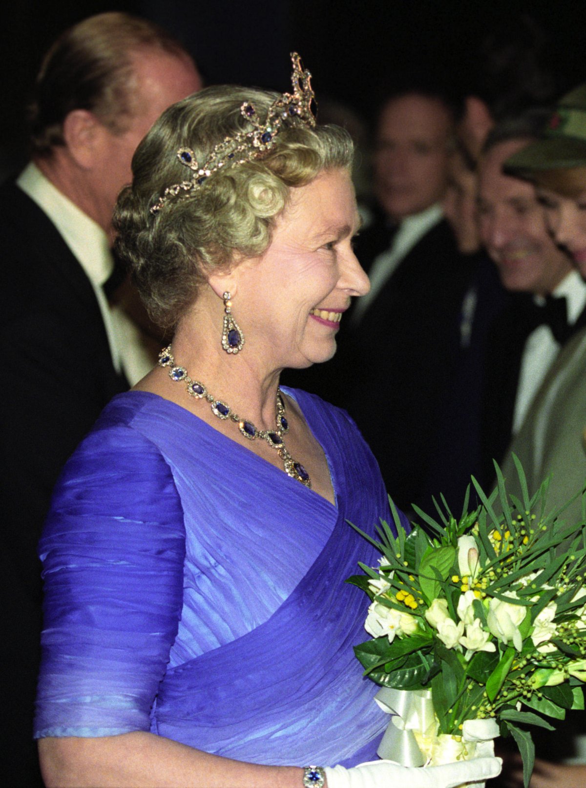 Queen Elizabeth II and the Duke of Edinburgh attend a celebration of the 40th anniversary of her accession to the throne at Earl's Court in London on October 26, 1992 (Martin Keene/PA Images/Alamy)