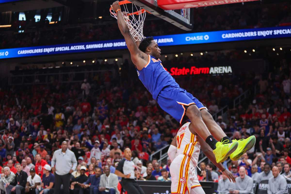 Apr 23, 2026; Atlanta, Georgia, USA; New York Knicks forward Og Anunoby (8) dunks against the Atlanta Hawks in the first quarter during game three of the first round of the 2026 NBA Playoffs at State Farm Arena. 
