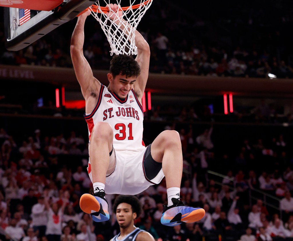 St. John's Lefteris Liotopoulos slams the ball.