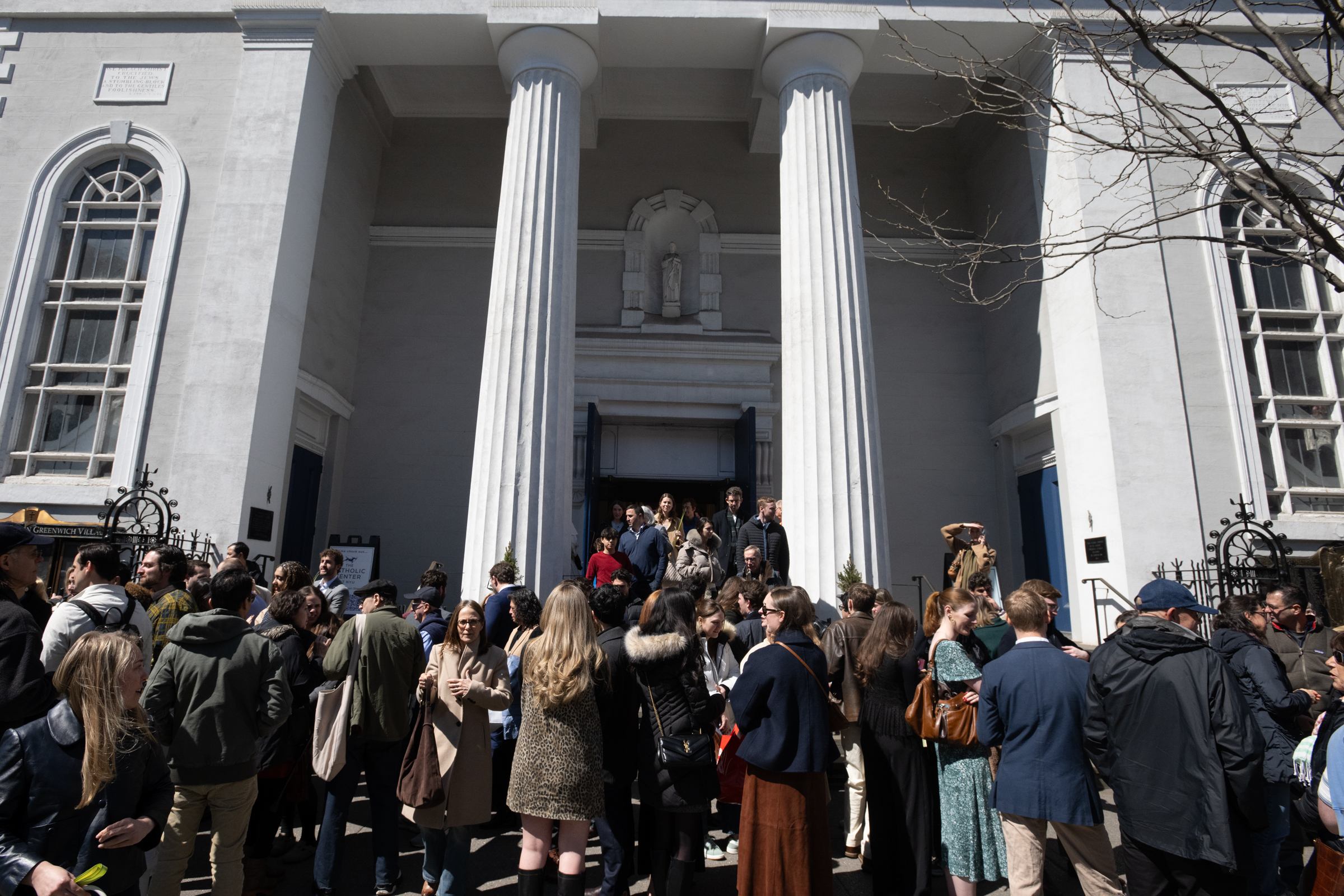 Young Catholics chat outside of St. Joseph’s NYC