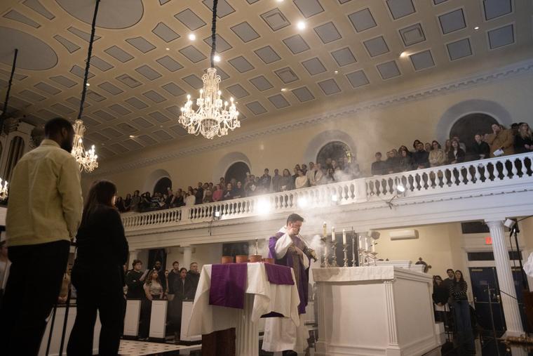 Dominican Father Jonah Teller incenses the altar during evening Ash Wednesday Mass on Feb. 18, 2026, at the Church of St. Joseph in Greenwich Village.