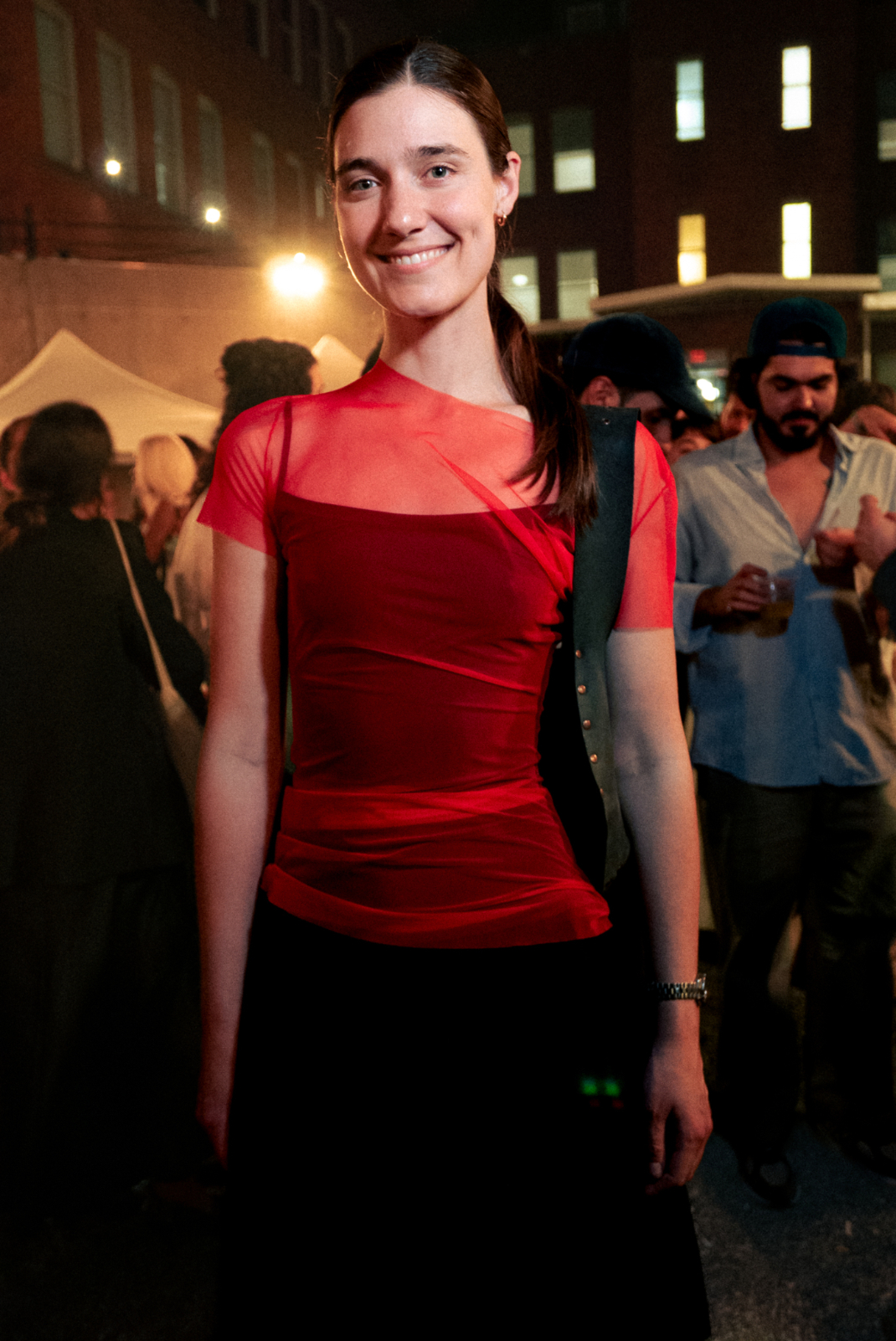 Sophie Becker in red dress at MoMA PS1