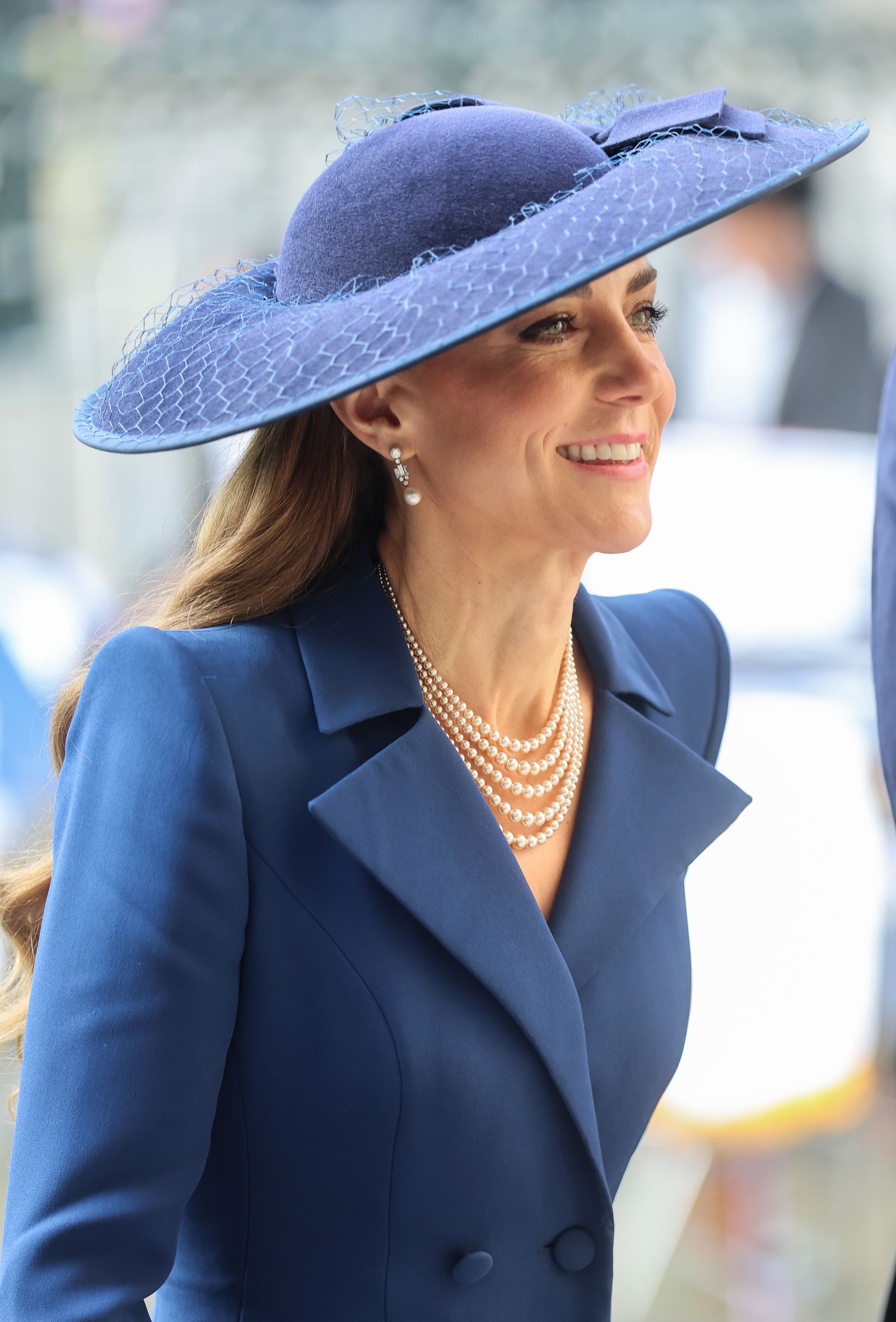 Image may contain Person Adult Clothing Hat Accessories Jewelry Necklace Coat and Head