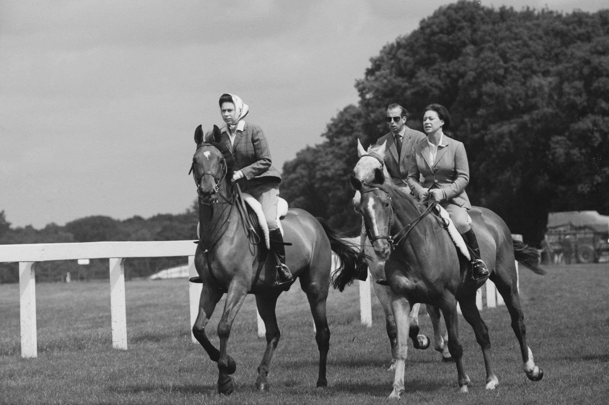 Queen Elizabeth II, Princess Margaret, and the Duke of Kent riding at Ascot Racecourse in 1968
