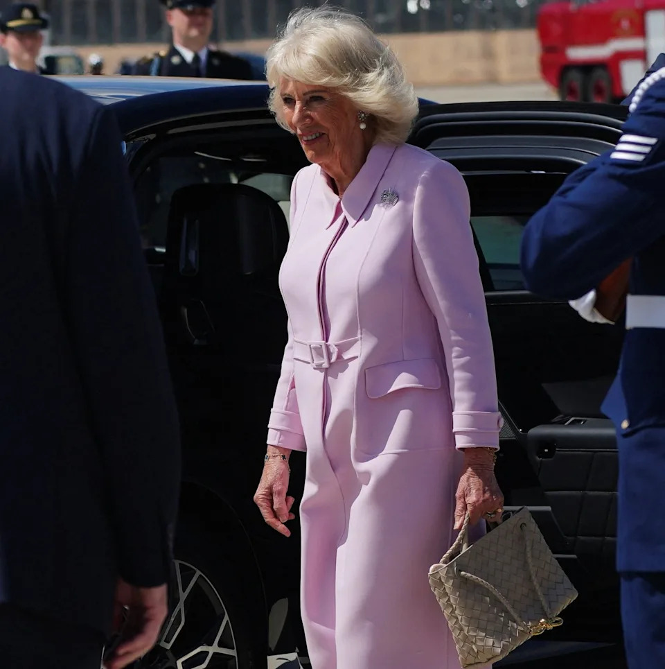 Britain's Queen Camilla walks after arrival with Britain's King Charles and for a state visit to the United States at Joint Base Andrews, Maryland