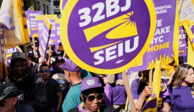 Members of the 32BJ SEIU union and their supporters rally on Park Avenue, in New York, Wednesday, April 15, 2026. (AP Photo/Seth Wenig)