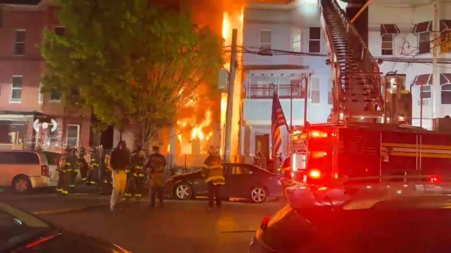 A three-alarm fire tore through a private dwelling in the Bronx late Thursday night (Credit: Citizen)