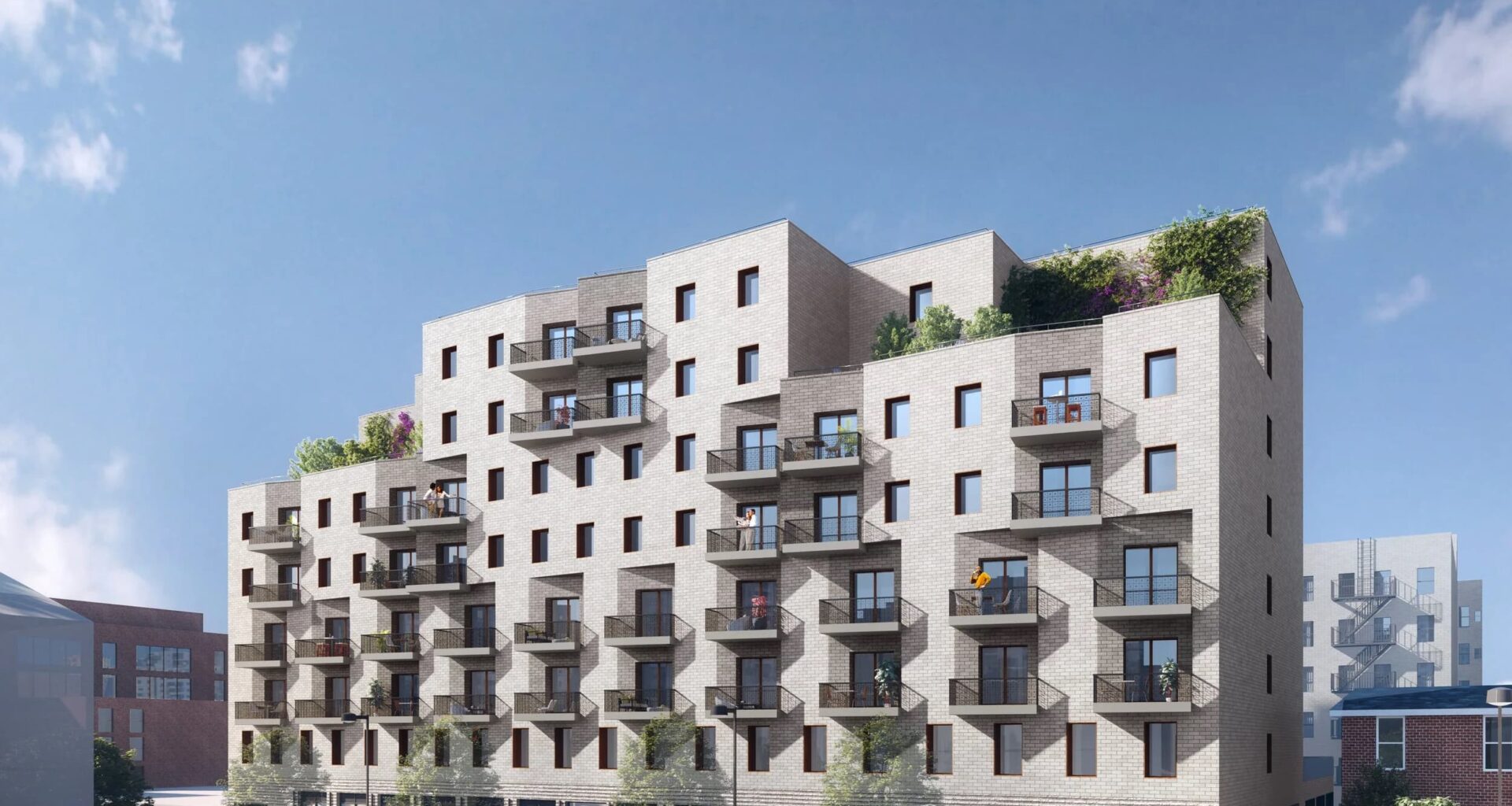 An architectural rendering of a large multifamily building