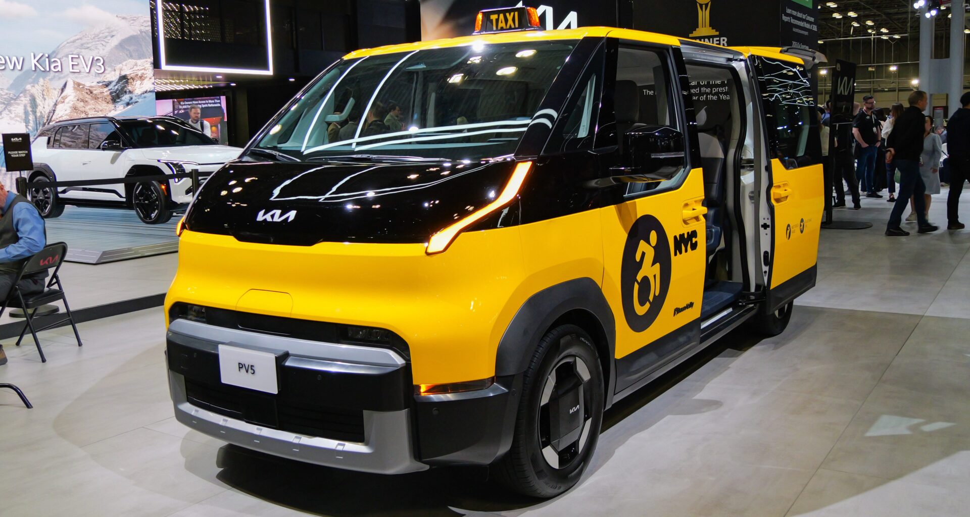 Yellow taxi cab in New York City with a vacant sign.