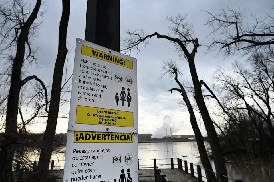 FORT EDWARD, NY - MARCH 11: Signs warning anglers that fish caught in the Hudson River are potentially harmful to consume are posted at Island Creek Park on Wednesday, March 11, 2026, in Albany, N.Y.