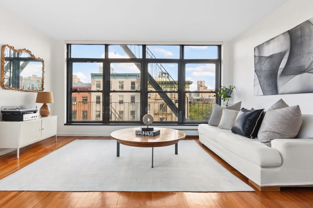 The loft comes with hardwood floors and is filled with light. Niko Strbac Photography