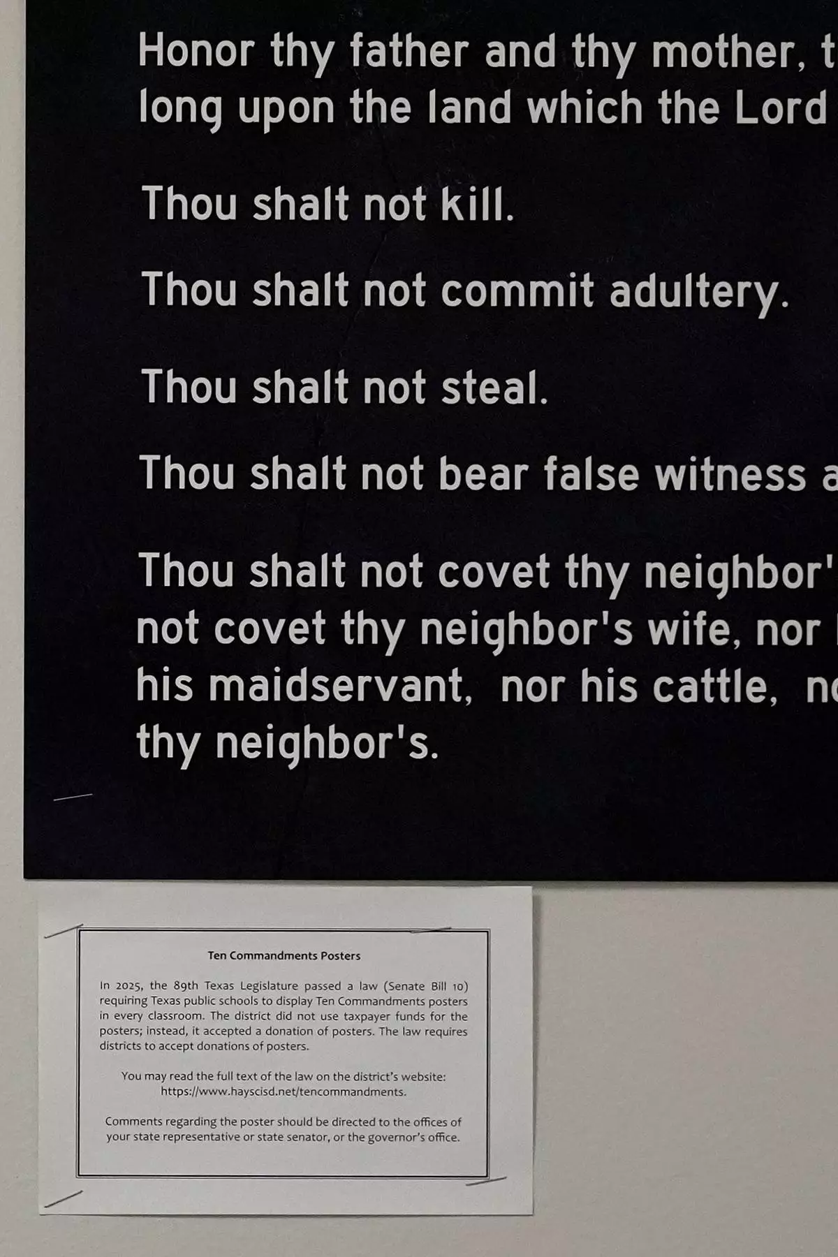 FILE - A Ten Commandments poster and explanation of the state's new law are displayed in a classroom at Lehman High School in Kyle, Texas, Thursday, Oct. 16, 2025. (AP Photo/Eric Gay,File)