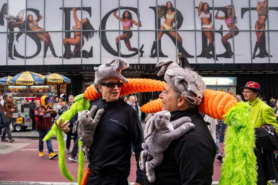 Phil Labossiere and Reed Evins arrive for the Easter Bonnet Parade on Fifth Avenue, Sunday, April 5, 2026, in New York. (AP Photo/Adam Gray)