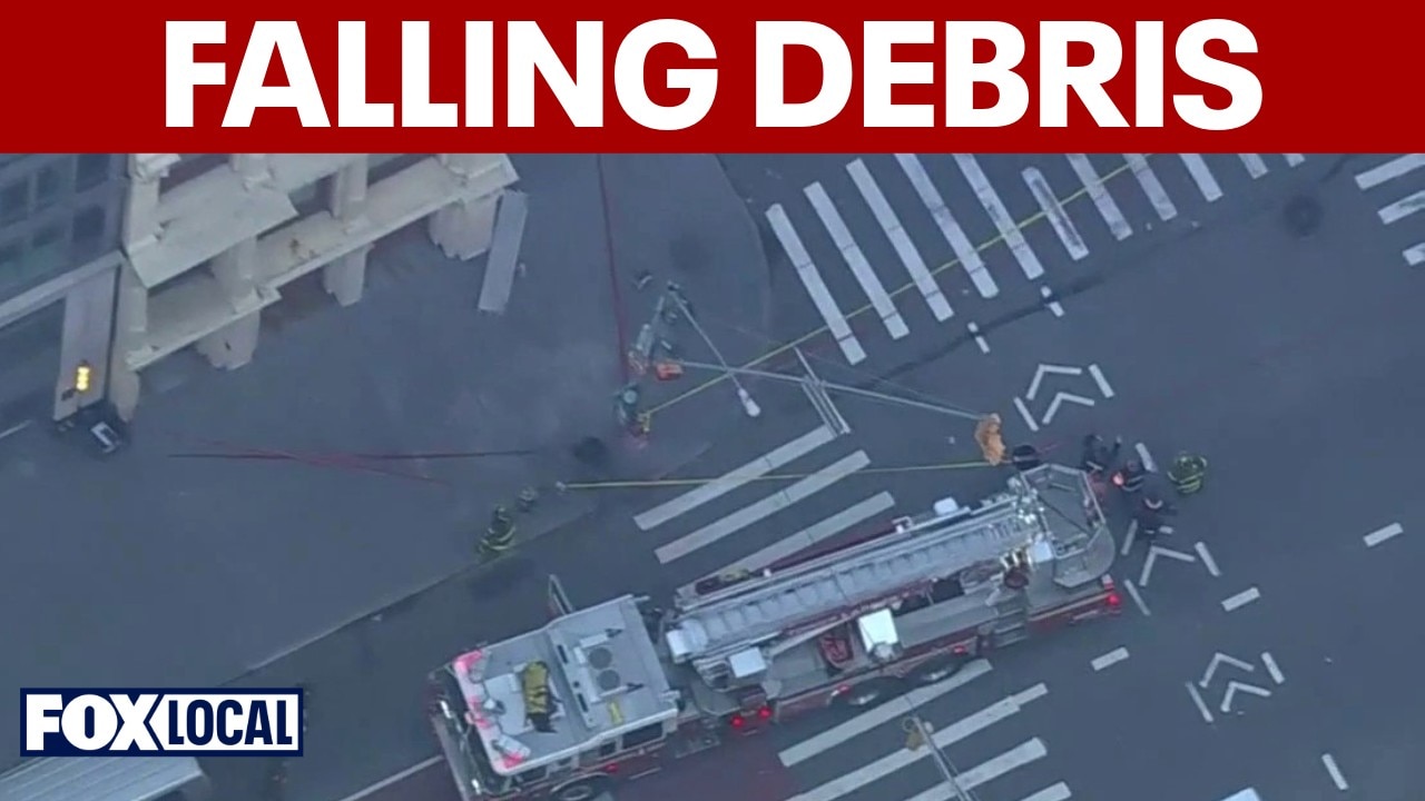 Debris falls from building in Lower Manhattan